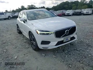 2019 Volvo XC60 Momentum with VIN YV4A22RK4K1371607, listed as a Copart auction lot 74207784 with 104,833 mi miles and Salvage title. Bid and sale history available at DreamBid. Image 12.