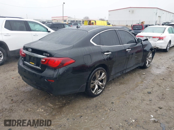 2015 Infiniti Q70 with VIN JN1BY1AR9FM561113, listed as a IAAI auction lot 41541936 with 266,227 mi miles and . Bid and sale history available at DreamBid. Image 4.