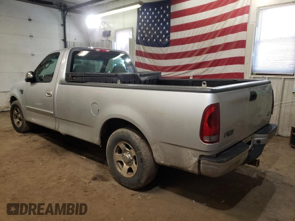 2002 Ford F-150 XL z VIN 1FTRF17W92NB99531, wystawiony jako Copart lot #49585545 z przebiegiem 148 167 mil mil oraz Szkoda całkowita • Salvage title. Historia ofert i sprzedaży dostępna na DreamBid. Obrazek 2.
