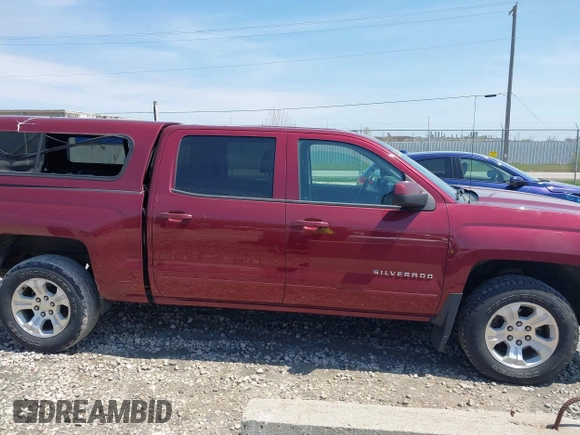 2015 Chevrolet Silverado 1500 LT with VIN 3GCUKREC0FG428366, listed as a IAAI auction lot 42210969 with 118,352 mi miles and . Bid and sale history available at DreamBid. Image 13.