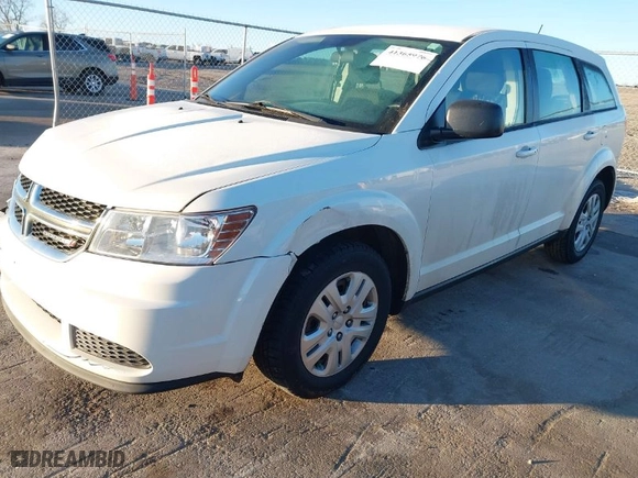 2014 Dodge Journey SE with VIN 3C4PDCAB7ET115807, listed as a IAAI auction lot 41365976 with 91,614 mi miles. Bid and sale history available at carsss.com. Image 2.