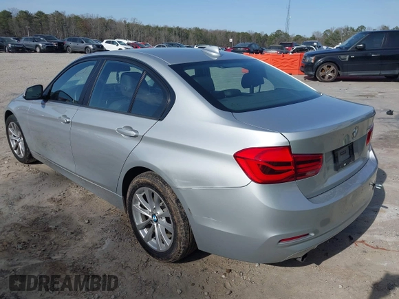 2018 BMW 3 Series 320i with VIN WBA8A9C55JAH14990, listed as a IAAI auction lot 41719896 with 77,472 mi miles. Bid and sale history available at carsss.com. Image 3.