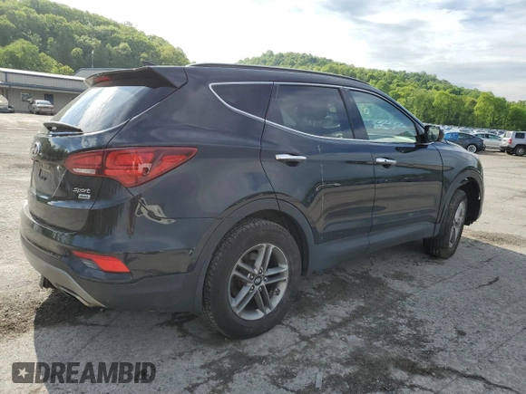 2017 Hyundai Santa Fe 2.4L z VIN 5XYZUDLB1HG412675, wystawiony jako Copart lot #57169045 z przebiegiem 38 947 mil mil oraz Szkoda całkowita • Salvage title. Historia ofert i sprzedaży dostępna na DreamBid. Obrazek 3.