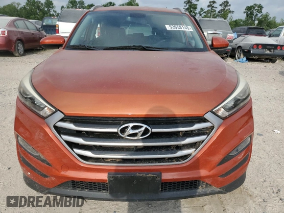 2017 Hyundai Tucson SE z VIN KM8J33A42HU486275, wystawiony jako Copart lot #53658145 z przebiegiem 31 928 mil mil oraz Szkoda całkowita • Salvage title. Historia ofert i sprzedaży dostępna na DreamBid. Obrazek 5.