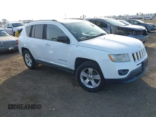 2011 Jeep Compass with VIN 1J4NT1FA5BD289644, listed as a IAAI auction lot 41320876 with 149,938 mi miles. Bid and sale history available at carsss.com. Image 1.