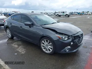 2014 Mazda 3 S Touring with VIN JM1BM1V31E1132448, listed as a IAAI auction lot 41815085 with 144,705 mi miles and . Bid and sale history available at DreamBid. Image 1.