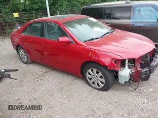 2007 Toyota Camry LE z VIN 4T1BK46K17U048107, wystawiony jako IAAI lot #42326033 z przebiegiem 235 138 mil mil oraz . Historia ofert i sprzedaży dostępna na DreamBid. Obrazek 1.