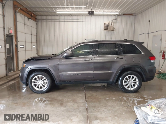 2021 Jeep Grand Cherokee Laredo X with VIN 1C4RJEAG4MC713856, listed as a IAAI auction lot 42446805 with 105,611 mi miles and . Bid and sale history available at DreamBid. Image 14.