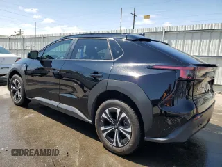2024 Subaru Solterra Premium z VIN JTMABABA9RA064491, wystawiony jako Copart lot #52993485 z przebiegiem 9079 mil mil oraz Szkody całkowita. Historia ofert i sprzedaży dostępna na DreamBid. Obrazek 2.