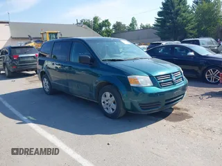 2009 Dodge Grand Caravan SE z VIN 2D8HN44E09R581490, wystawiony jako IAAI lot #42859494 z przebiegiem 166 278 mil mil oraz . Historia ofert i sprzedaży dostępna na DreamBid. Obrazek 1.