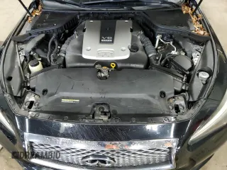 2015 Infiniti Q50 Premium z VIN JN1BV7AR2FM419987, wystawiony jako Copart lot #57813825 z przebiegiem 99 229 mil mil oraz Nie do naprawy. Historia ofert i sprzedaży dostępna na DreamBid. Obrazek 11.