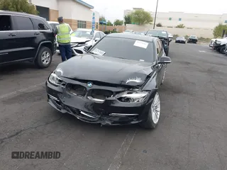 2014 BMW 3 Series 328i xDrive with VIN WBA3B5C51EP543364, listed as a IAAI auction lot 42138365 with 145,243 mi miles and . Bid and sale history available at DreamBid. Image 6.