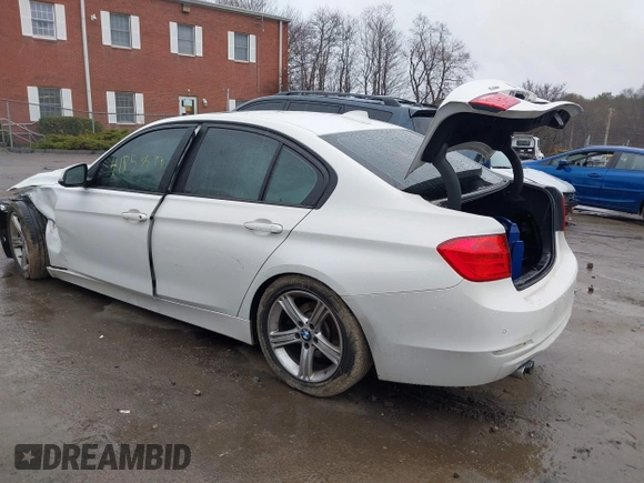 2014 BMW 3 Series 328i xDrive with VIN WBA3B5C56EF599323, listed as a IAAI auction lot 41853533 with 114,358 mi miles. Bid and sale history available at carsss.com. Image 3.