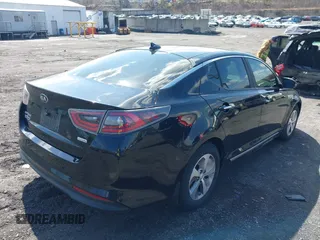 2016 Kia Optima Hybrid with VIN KNAGM4AD8G5092898, listed as a IAAI auction lot 42045490 with 148,673 mi miles. Bid and sale history available at carsss.com. Image 4.