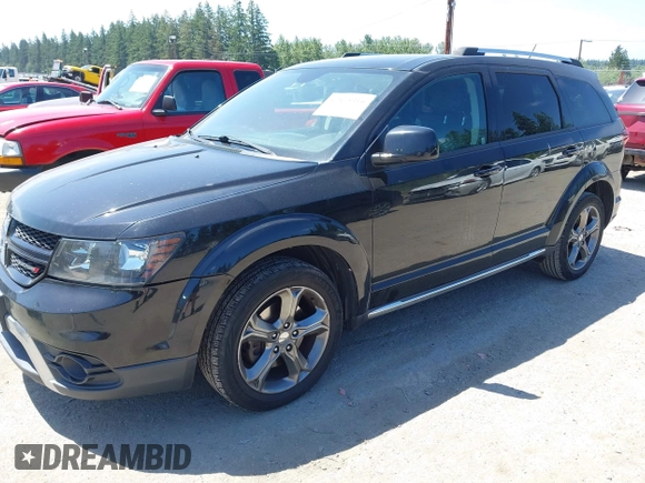 2015 Dodge Journey Crossroad z VIN 3C4PDDGGXFT607189, wystawiony jako IAAI lot #42475316 z przebiegiem 186 317 mil mil oraz . Historia ofert i sprzedaży dostępna na DreamBid. Obrazek 2.