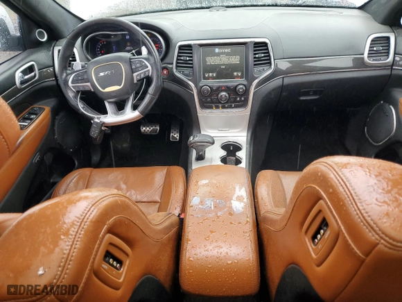 2015 Jeep Grand Cherokee SRT with VIN 1C4RJFDJ6FC941941, listed as a Copart auction lot 50613315 with 173,992 mi miles and Salvage Title. Bid and sale history available at carsss.com. Image 8.
