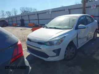 2022 Kia Rio S with VIN 3KPA24AD4NE434315, listed as a IAAI auction lot 41709976 with 65,000 mi miles and . Bid and sale history available at carsss.com. Image 2.