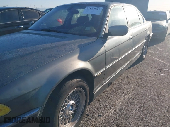 2001 BMW 7 Series 740iL with VIN WBAGH83491DP25818, listed as a IAAI auction lot 41827907 with 125,670 mi miles. Bid and sale history available at carsss.com. Image 6.