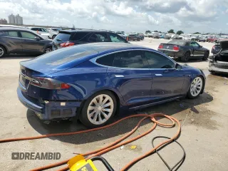 2017 Tesla Model S 60 с VIN 5YJSA1E14HF185924, выставлен на аукционе Copart как лот 57101065 с пробегом 68 268 миль миль и На запчасти • Non repairable. История ставок и продаж доступна на DreamBid. Изображение 3.