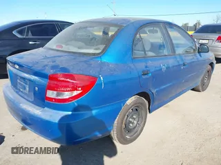2003 Kia Rio with VIN KNADC125936239472, listed as a IAAI auction lot 41729536 with 156,421 mi miles. Bid and sale history available at carsss.com. Image 4.
