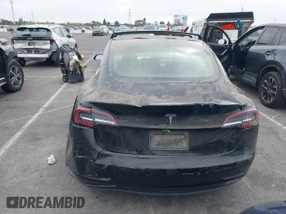 2019 Tesla Model 3 Mid Range with VIN 5YJ3E1EA2KF362048, listed as a IAAI auction lot 40141734 with 70,321 mi miles and . Bid and sale history available at carsss.com. Image 15.