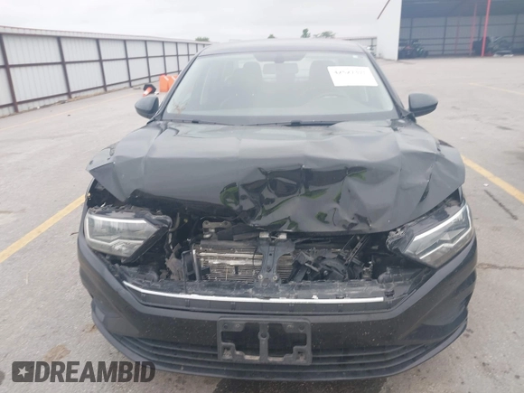 2021 Volkswagen Jetta S z VIN 3VWC57BU5MM008733, wystawiony jako IAAI lot #42527371 z przebiegiem 76 548 mil mil oraz . Historia ofert i sprzedaży dostępna na DreamBid. Obrazek 12.