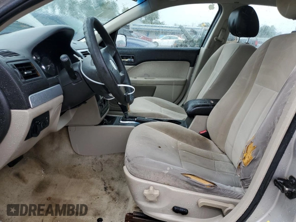 2008 Mercury Milan with VIN 3MEHM07138R649873, listed as a Copart auction lot 73098794 with 297,898 mi miles and Salvage title. Bid and sale history available at DreamBid. Image 7.