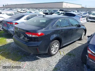 2024 Toyota Corolla Hybrid LE with VIN JTDBCMFE7R3054126, listed as a IAAI auction lot 41784668 with 15,864 mi miles. Bid and sale history available at carsss.com. Image 4.