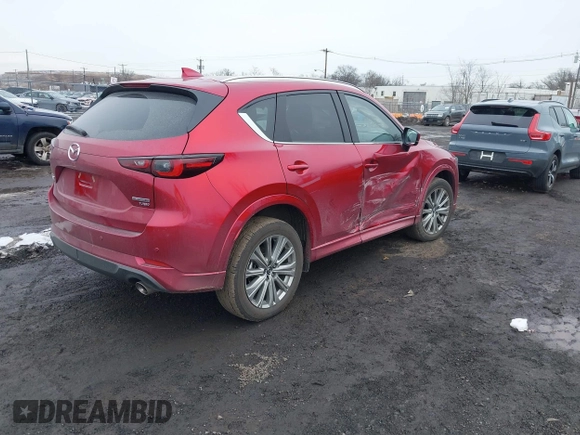 2023 Mazda CX-5 Signature with VIN JM3KFBXY3P0282456, listed as a IAAI auction lot 41542915 with 3,376 mi miles and . Bid and sale history available at carsss.com. Image 4.