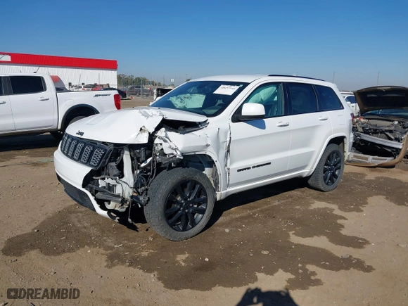 2018 Jeep Grand Cherokee Laredo E with VIN 1C4RJFAGXJC435658, listed as a IAAI auction lot 40659459 with 97,827 mi miles. Bid and sale history available at carsss.com. Image 2.