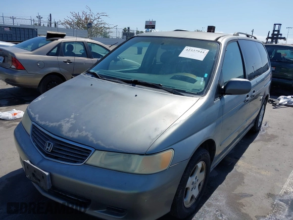 2001 Honda Odyssey EX z VIN 2HKRL18641H504729, wystawiony jako IAAI lot #42337944 z przebiegiem 203 356 mil mil oraz . Historia ofert i sprzedaży dostępna na DreamBid. Obrazek 2.