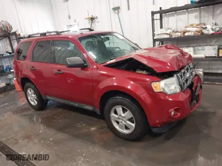 2011 Ford Escape XLT with VIN 1FMCU9DG8BKA27544, listed as a IAAI auction lot 41844132 with 136,220 mi miles. Bid and sale history available at carsss.com. Image 1.