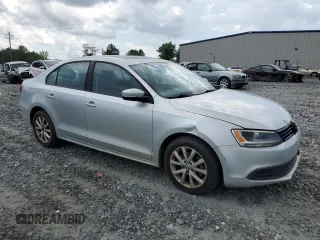 2012 Volkswagen Jetta SE with VIN 3VWDX7AJ1CM389131, listed as a Copart auction lot 64947474 with 140,331 mi miles and Salvage title. Bid and sale history available at DreamBid. Image 4.