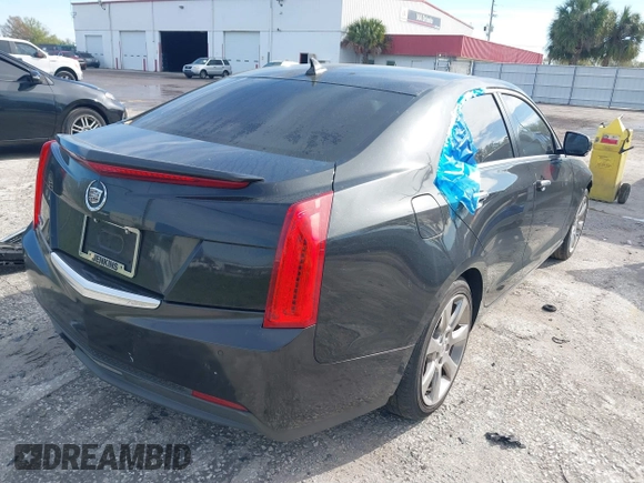 2013 Cadillac ATS Luxury z VIN 1G6AB5RA4D0149849, wystawiony jako IAAI lot #41754315 z przebiegiem 107 490 mil mil oraz . Historia ofert i sprzedaży dostępna na DreamBid. Obrazek 4.