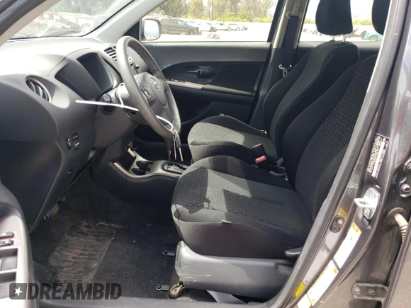 2014 Scion xD with VIN JTKKUPB41E1046114, listed as a Copart auction lot 54599235 with 125,979 mi miles and Salvage title. Bid and sale history available at DreamBid. Image 7.