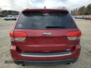 2014 Jeep Grand Cherokee Limited with VIN 1C4RJEBT7EC147432, listed as a Copart auction lot 83339654 with 145,017 mi miles and Salvage Title. Bid and sale history available at DreamBid. Image 6.