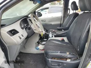 2011 Toyota Sienna SE with VIN 5TDXK3DC0BS121254, listed as a Copart auction lot 58588875 with 151,334 mi miles and Salvage title. Bid and sale history available at DreamBid. Image 7.