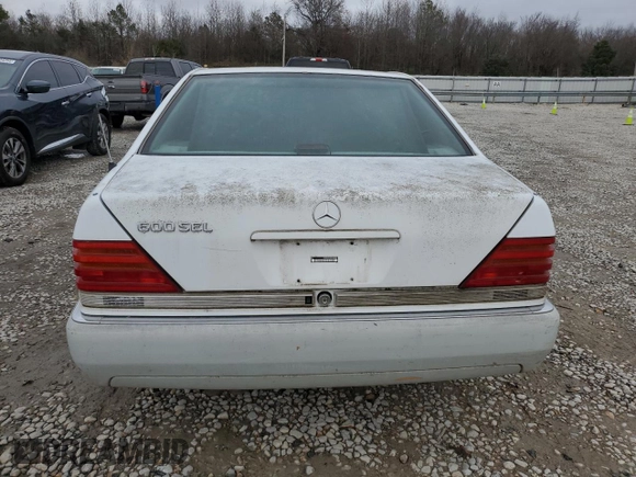 1992 Mercedes-Benz 560 with VIN WDBGA57E7NA068936, listed as a Copart auction lot 85746754 with 132,264 mi miles and Clean Title. Bid and sale history available at DreamBid. Image 6.