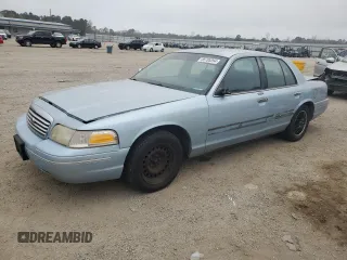 1999 Ford Crown Victoria z VIN 2FAFP73W1XX125413, wystawiony jako Copart lot #85785264 z przebiegiem 142 982 mil mil oraz Szkody całkowita. Historia ofert i sprzedaży dostępna na DreamBid. Obrazek 1.