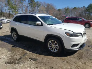 2020 Jeep Cherokee Latitude with VIN 1C4PJLCB5LD586413, listed as a Copart auction lot 45717675 with 138,476 mi miles and Salvage title. Bid and sale history available at DreamBid. Image 4.