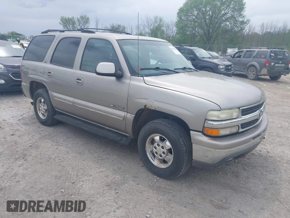 2001 Chevrolet Tahoe LS z VIN 1GNEC13T11J107893, wystawiony jako IAAI lot #42261213 z przebiegiem 338 454 mil mil oraz . Historia ofert i sprzedaży dostępna na DreamBid. Obrazek 1.