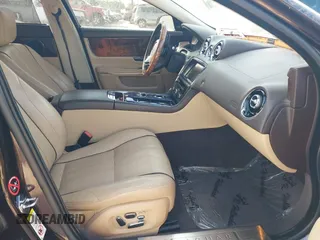 2013 Jaguar XJ Portfolio with VIN SAJWJ2GD2D8V44780, listed as a IAAI auction lot 41875069 with 87,806 mi miles and . Bid and sale history available at DreamBid. Image 5.
