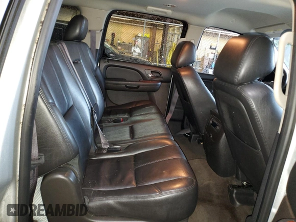 2013 Chevrolet Suburban LT with VIN 1GNSCJE00DR260275, listed as a Copart auction lot 50394425 with 140,464 mi miles and Salvage title. Bid and sale history available at DreamBid. Image 11.
