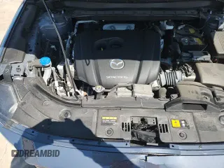 2022 Mazda CX-5 S Carbon Edition z VIN JM3KFBCM3N0535288, wystawiony jako Copart lot #71124635 z przebiegiem 30 737 mil mil oraz Szkoda całkowita • Salvage title. Historia ofert i sprzedaży dostępna na DreamBid. Obrazek 14.