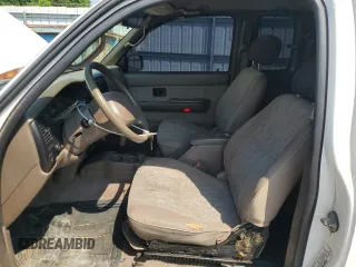 1999 Toyota Tacoma PreRunner with VIN 4TASN92NXXZ551335, listed as a Copart auction lot 62199645 with 198,754 mi miles and Salvage title. Bid and sale history available at DreamBid. Image 7.