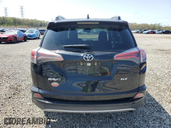 2018 Toyota RAV4 XLE with VIN 2T3WFREV4JW517610, listed as a Copart auction lot 51218285 with 193,684 mi miles and Clean Title. Bid and sale history available at DreamBid. Image 6.