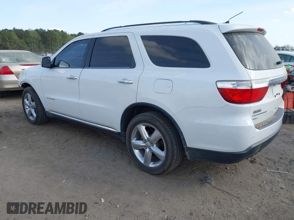 2013 Dodge Durango Citadel with VIN 1C4RDJEG0DC665962, listed as a IAAI auction lot 41900527 with 173,550 mi miles and . Bid and sale history available at carsss.com. Image 3.
