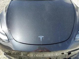 2024 Tesla Model Y Performance z VIN 7SAYGDEF6RF166365, wystawiony jako Copart lot #48885585 z przebiegiem Nie podano mil oraz Szkoda całkowita • Salvage title. Historia ofert i sprzedaży dostępna na DreamBid. Obrazek 12.