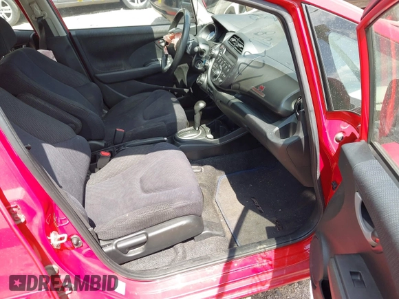 2012 Honda Fit Sport with VIN JHMGE8H54CC030747, listed as a IAAI auction lot 42272618 with 115,347 mi miles and . Bid and sale history available at DreamBid. Image 5.