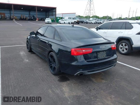 2014 Audi A6 Prestige with VIN WAUHGAFC6EN141698, listed as a IAAI auction lot 42330033 with 174,401 mi miles and . Bid and sale history available at DreamBid. Image 3.